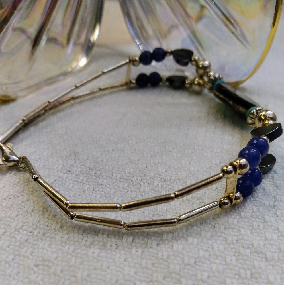 Women's multi stone bracelet with silver tone accents. 8". Good used condition. - Picture 3 of 11